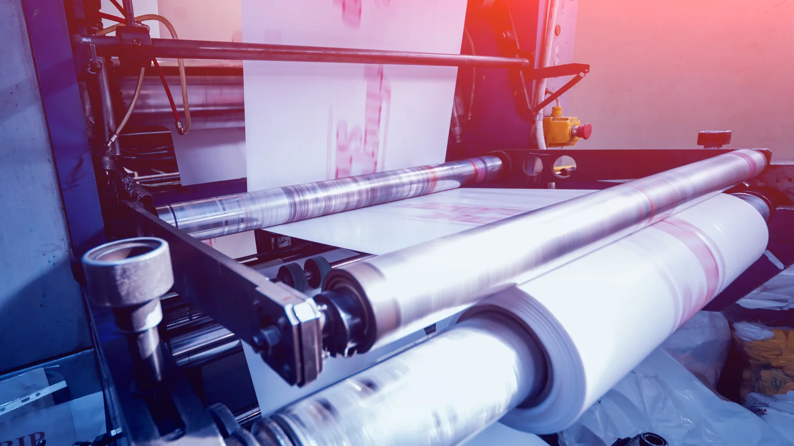 Packaging film running through an industrial printing machine